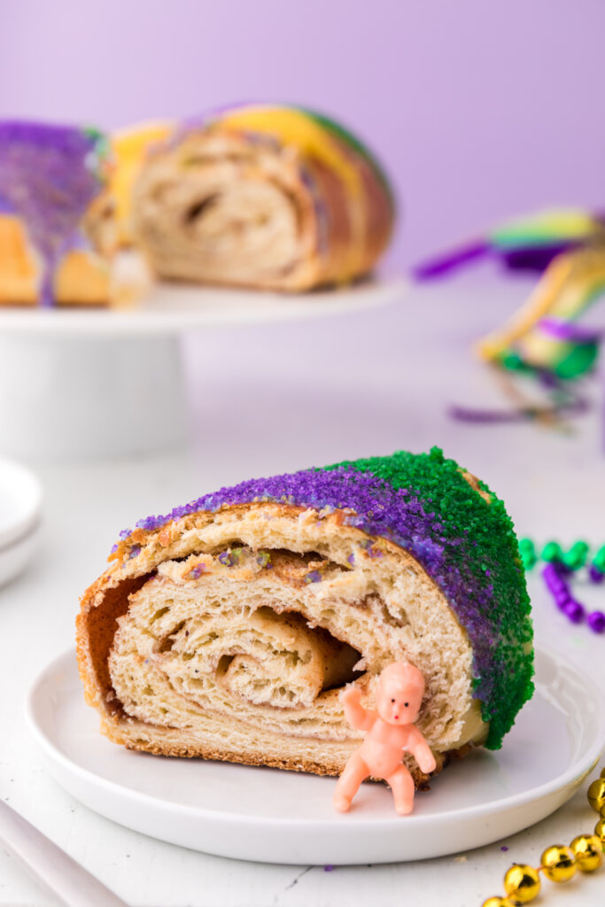 slice of king cake on plate for mardi gras