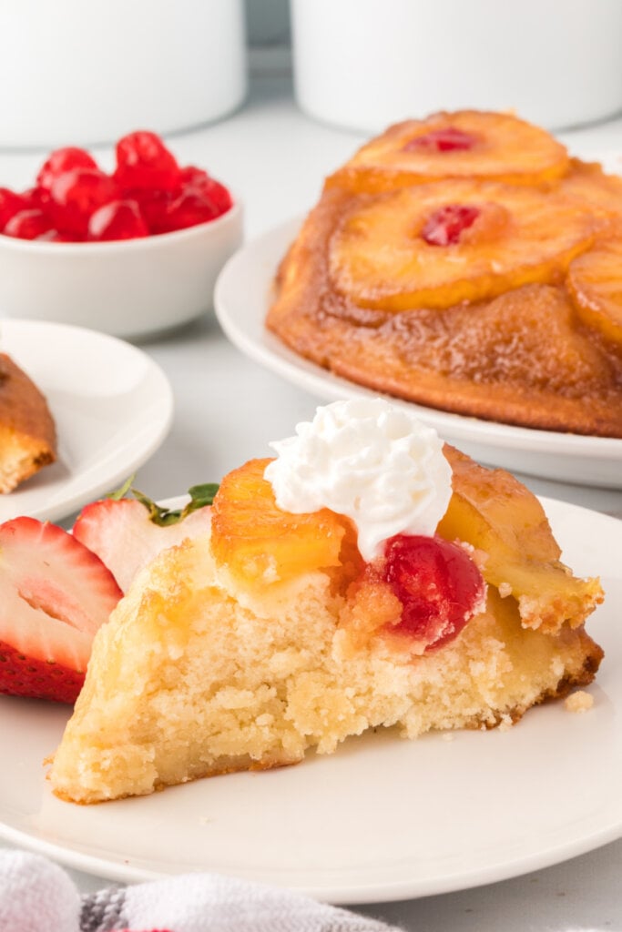 slice of pineapple upside-down cake on plate