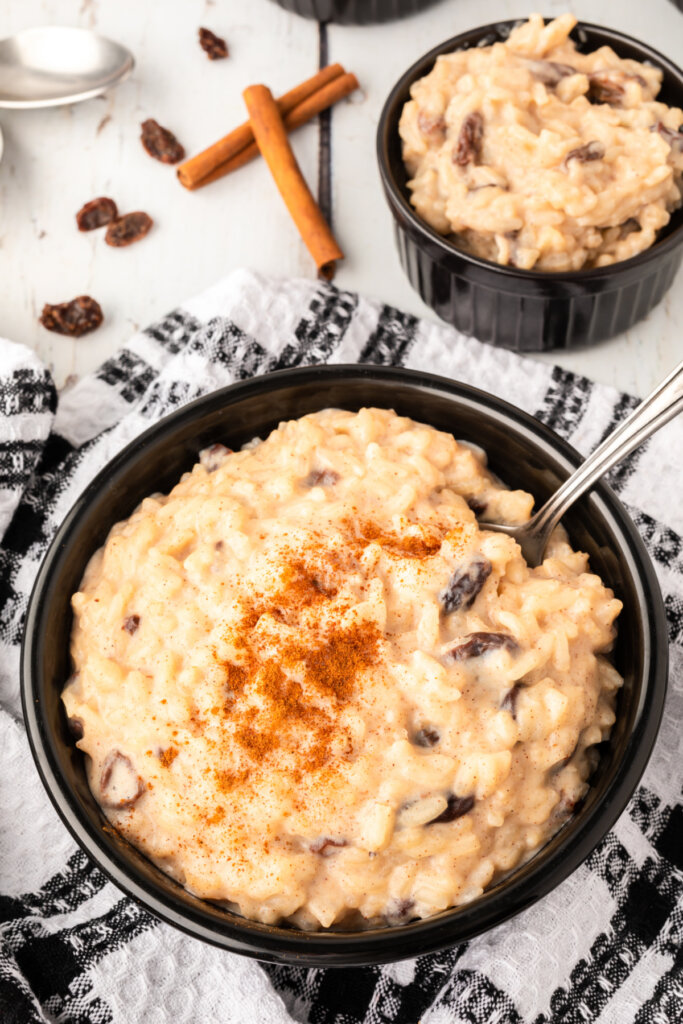 bowl of rice pudding with a sprinkle of cinnamon