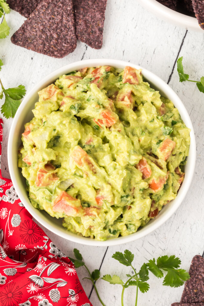 looking down into a bowl of homemade guacamole