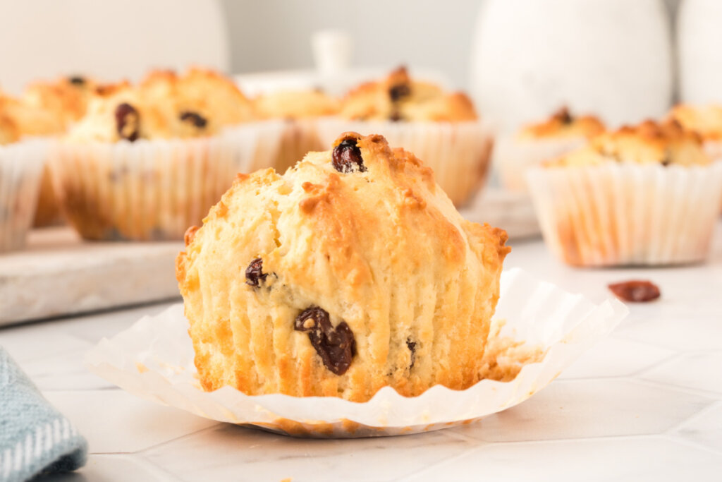 unwrapped irish soda muffin on table