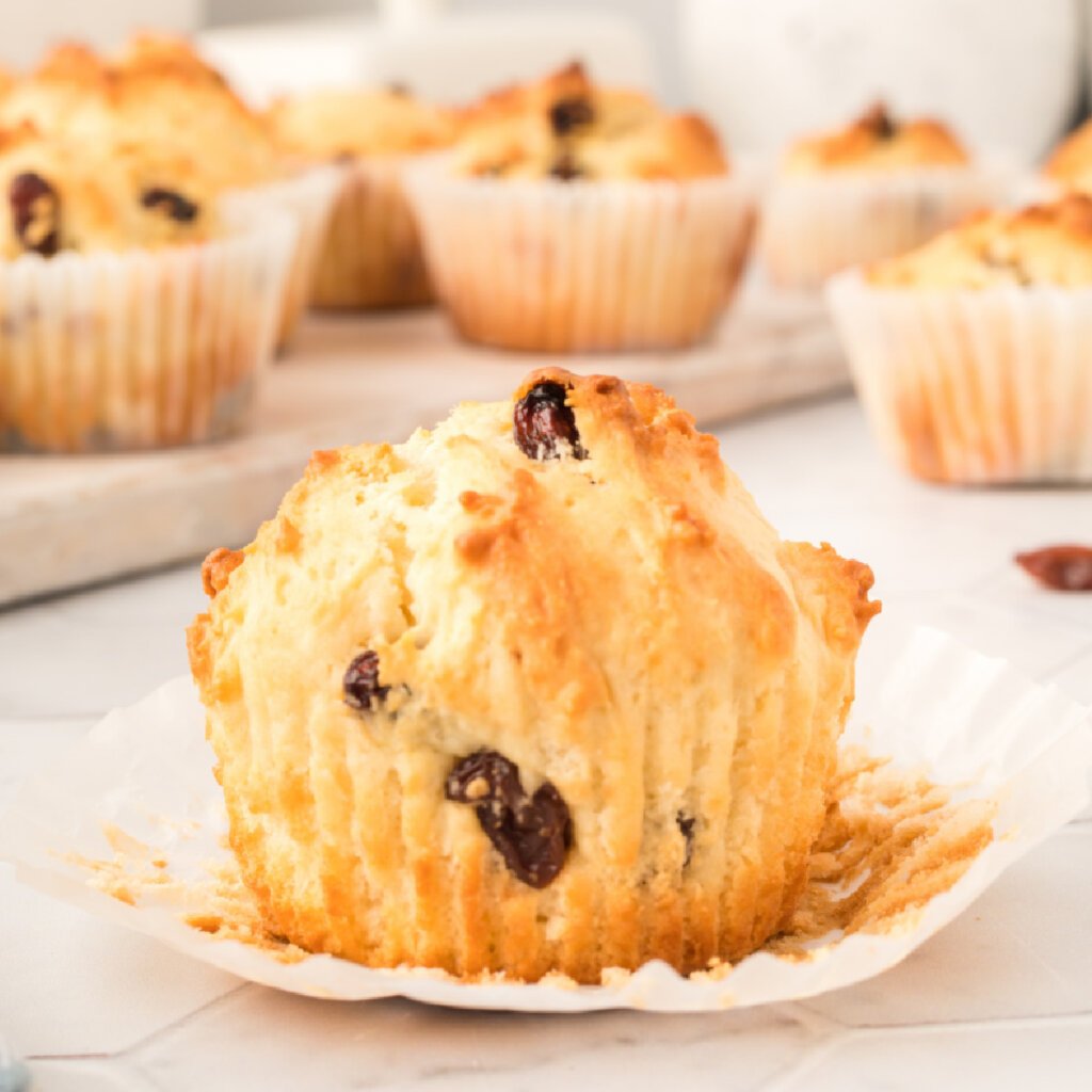 irish soda muffin with the paper peeled down