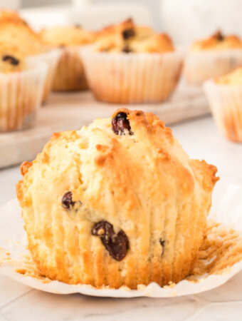 irish soda muffin with the paper peeled down