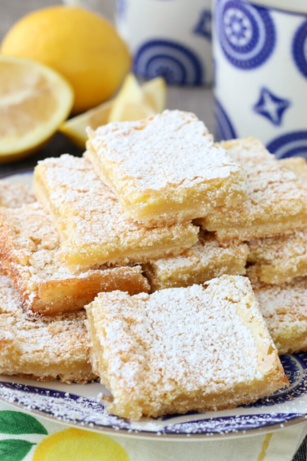 stacked lemon bars on plate