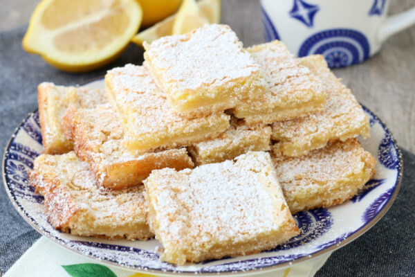 stck of lemon bars on plate
