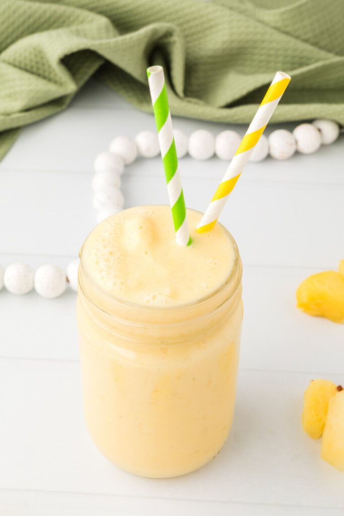 orange pineapple smoothie in glass