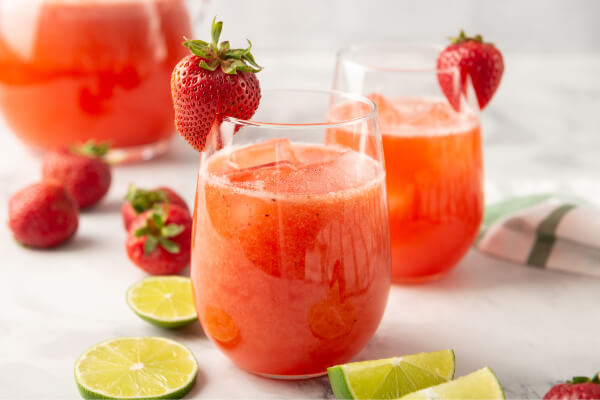 two glasses of strawberry agua fresca