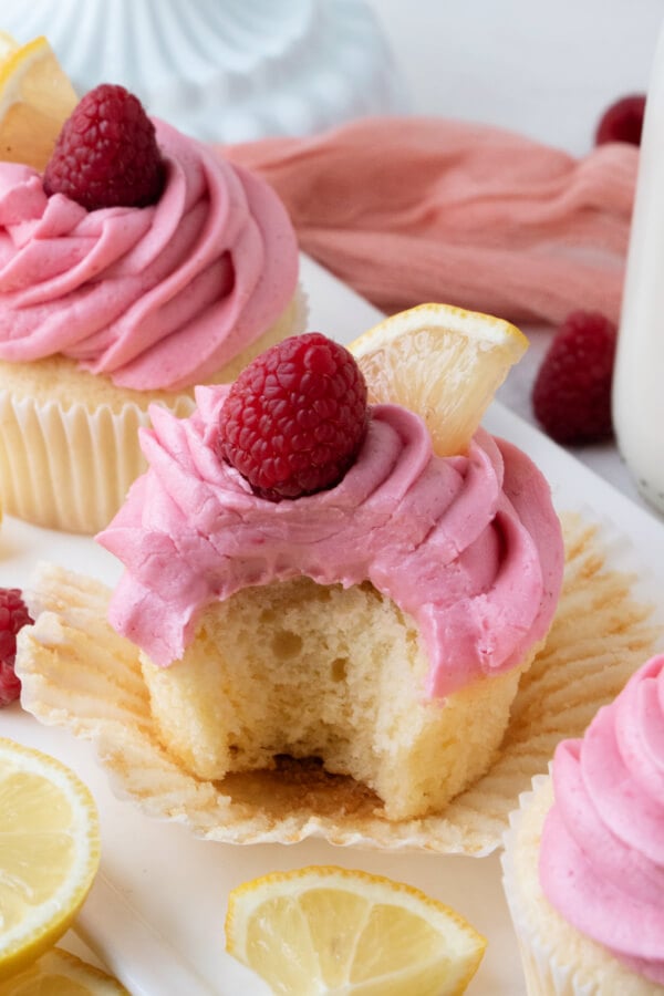 frosted cupcake with a bite taken out of it