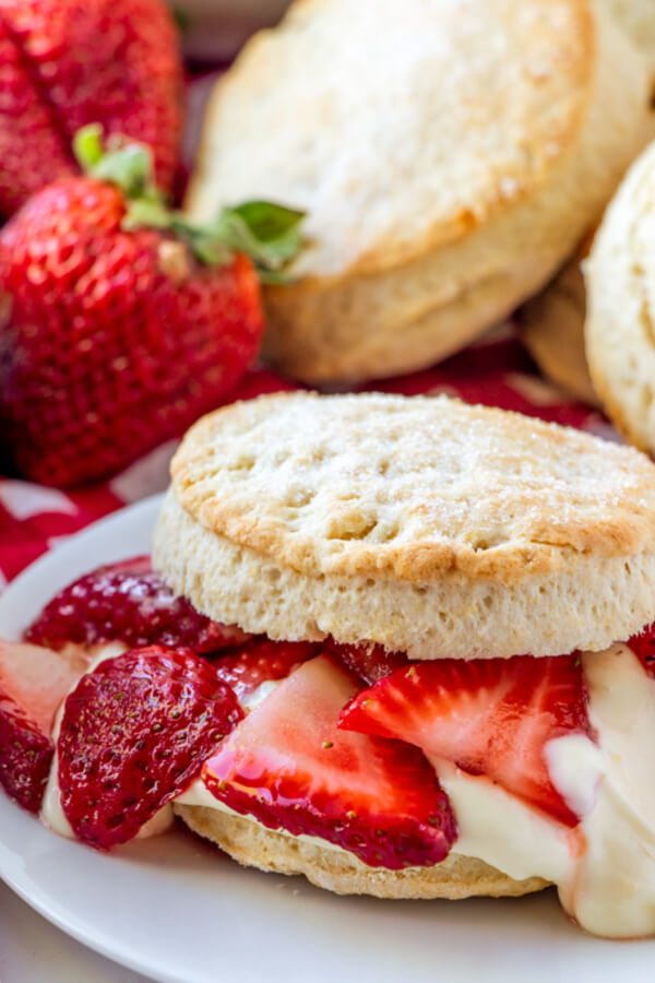 strawberry shortcake with lemon cream sauce on plate