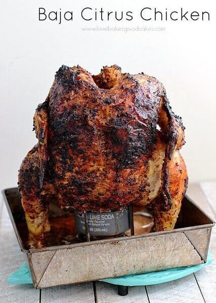 baja citrus chicken on beer can stand in metal tray