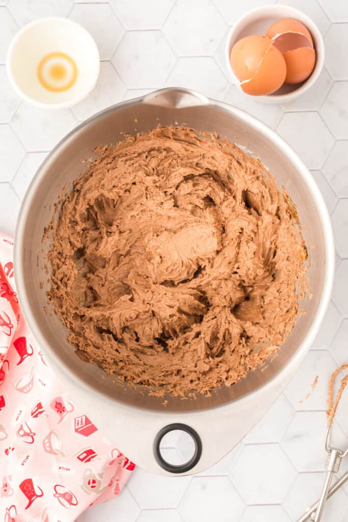 Chocolate cookie mixture after eggs and vanilla have been incorporated into the dough