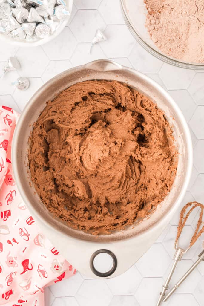 Chocolate Blossoms cookie dough partially mixed with dry ingredients incorporated