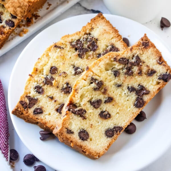 two slices of chocolate chipound cake on white plate