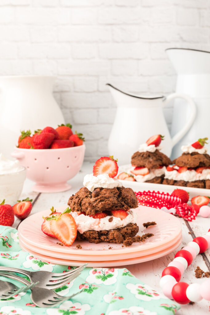 chocolate strawberry shortcake on a light pink plate