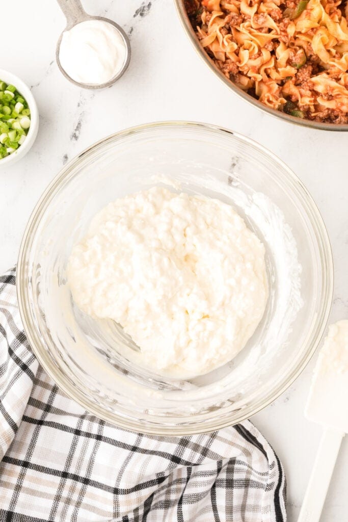 smooth cream cheese and cottage cheese mixture in a glass bowl