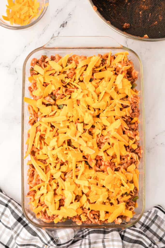 shredded cheddar cheese sprinkled over the top of the casserole before baking