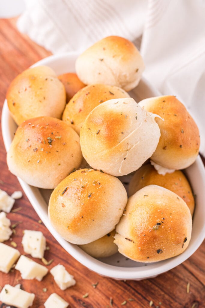 garlic herb cheese bombs stacked in white serving platter