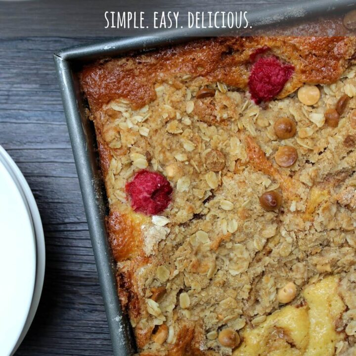 White chocolate raspberry crumb cake in a baking pan.