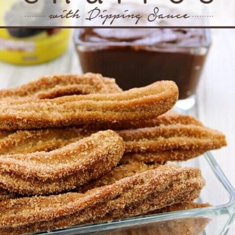 Mexican Chocolate Churros with Dipping Sauce in a clear dish.