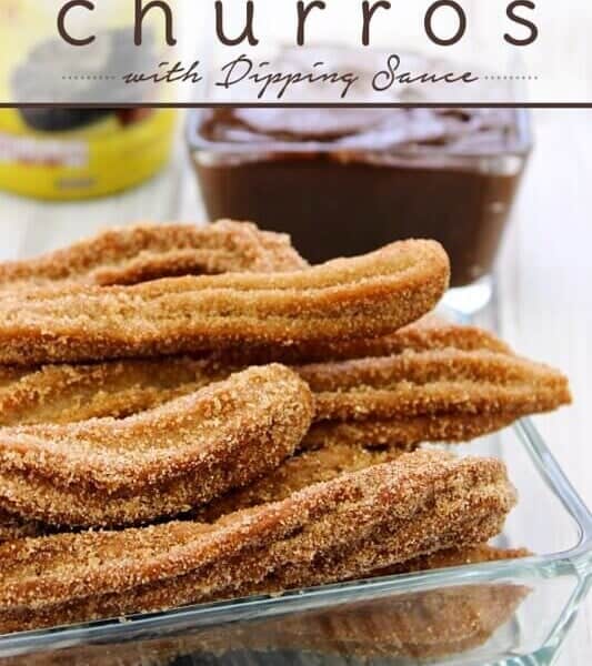 Mexican Chocolate Churros with Dipping Sauce in a clear dish.
