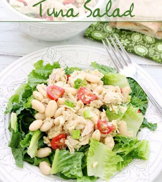 Mediterranean Tuna Salad on a white plate with a fork.