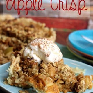 Pumpkin Pie Apple Crisp on a blue plate with a fork.