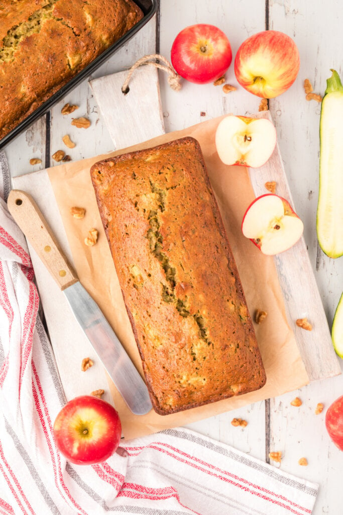 looking down onto a whole loaf of apple zucchini bread