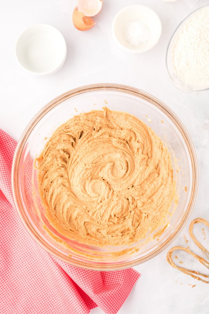 smooth cookie butter dough for Biscoff Butter Cookies in a glass mixing bowl