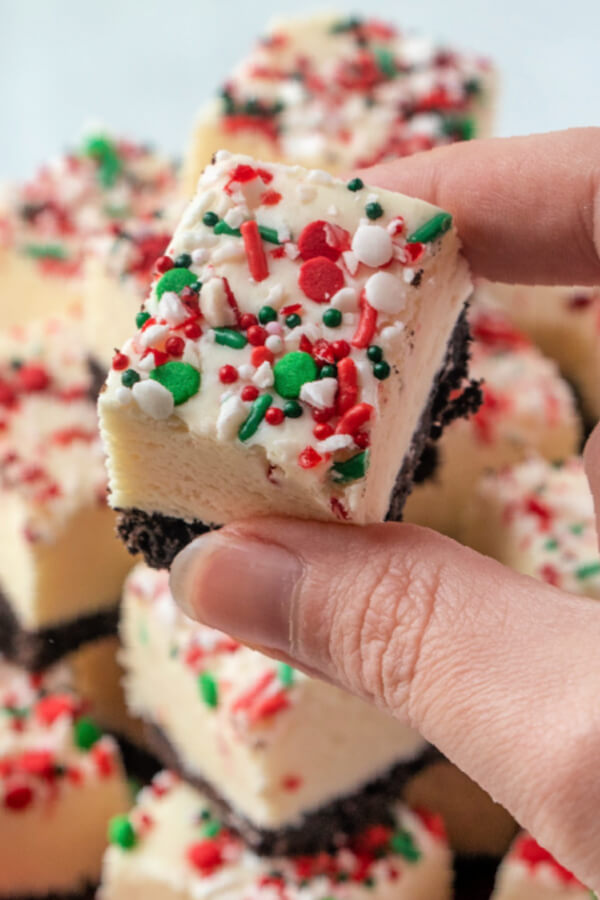 hand holding a piece of finished fudge