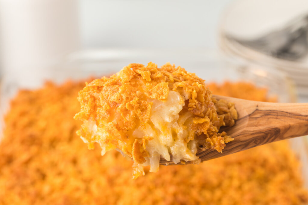 funeral potatoes on wooden spoon