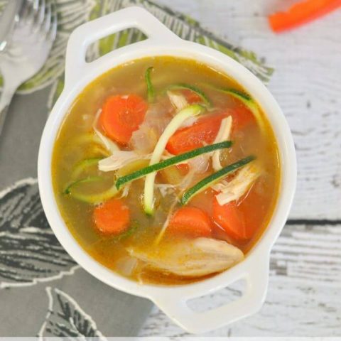 Southwestern Chicken Zoodle Soup in a white bowl.