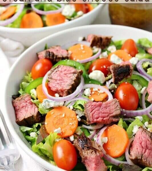 Steak and Blue Cheese Salad in a white bowl.