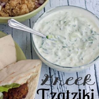 Greek Tzatziki Dip in a bowl with a spoon.
