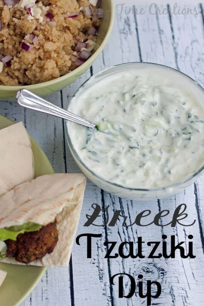 Greek Tzatziki Dip in a bowl with a spoon.