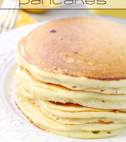 Lemon Berry Pancakes stacked on a plate.