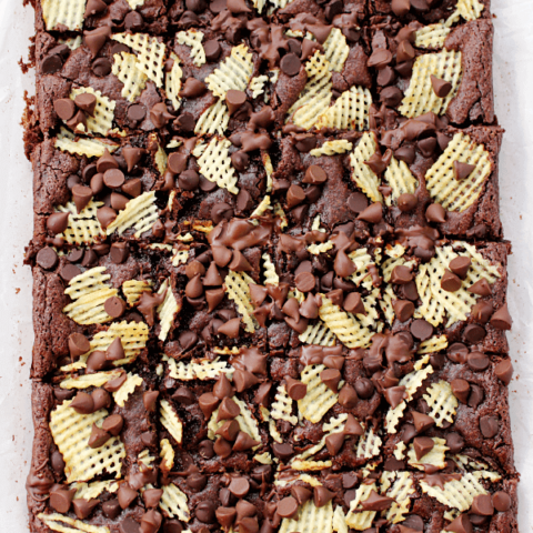 PMS Brownies with Cape Cod® Potato Chips on parchment paper.
