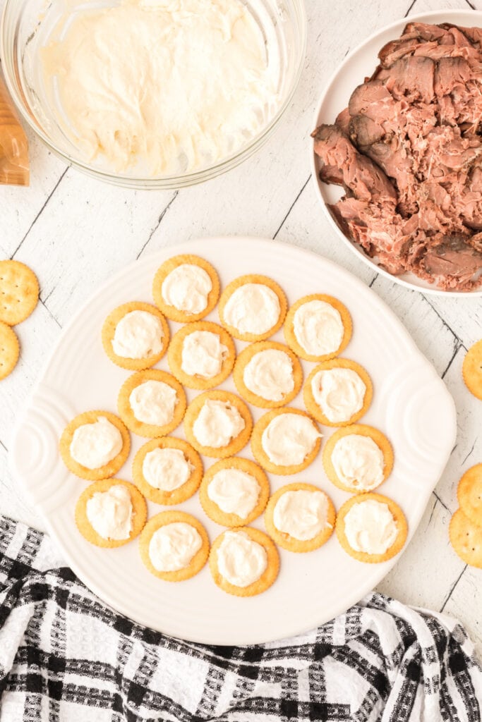 crackers with cream cheese mixture on top. 