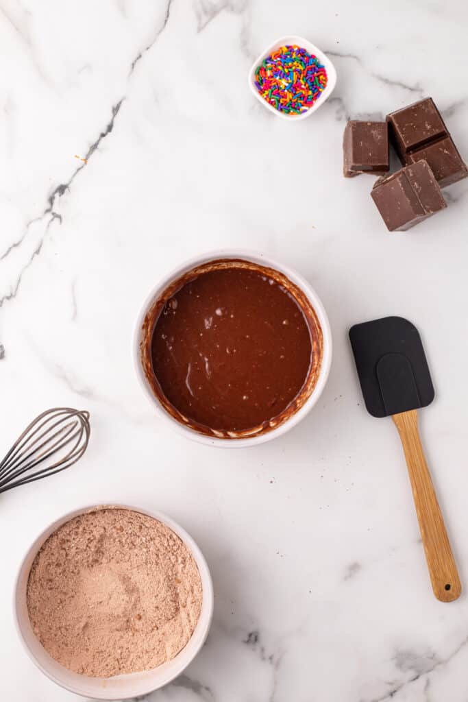 Smooth chocolate batter prepared for homemade chocolate taco shells before cooking.