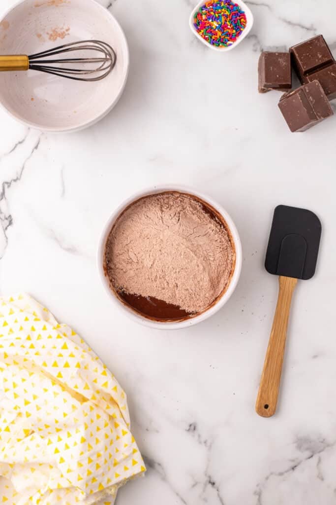 Dry ingredients added to the chocolate mixture before mixing the batter for homemade Choco-Tacos.