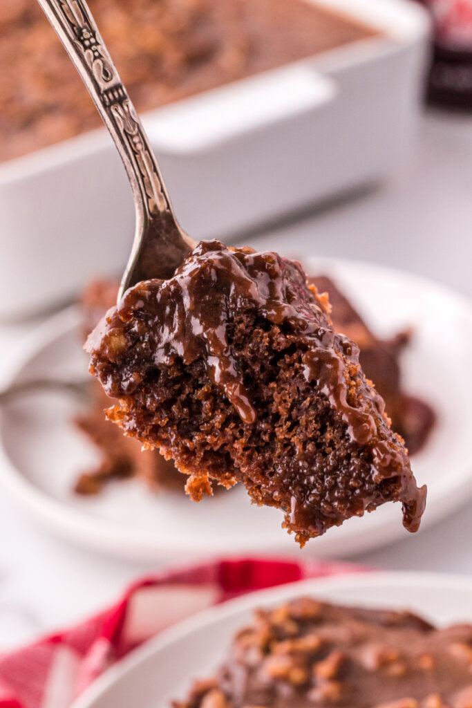 bite of coca cola cake on fork