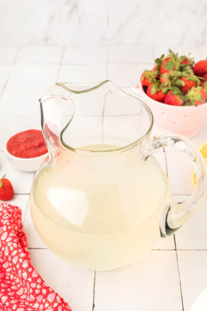 Homemade lemonade in a glass pitcher ready for Copycat Red Robin Freckled Lemonade.
