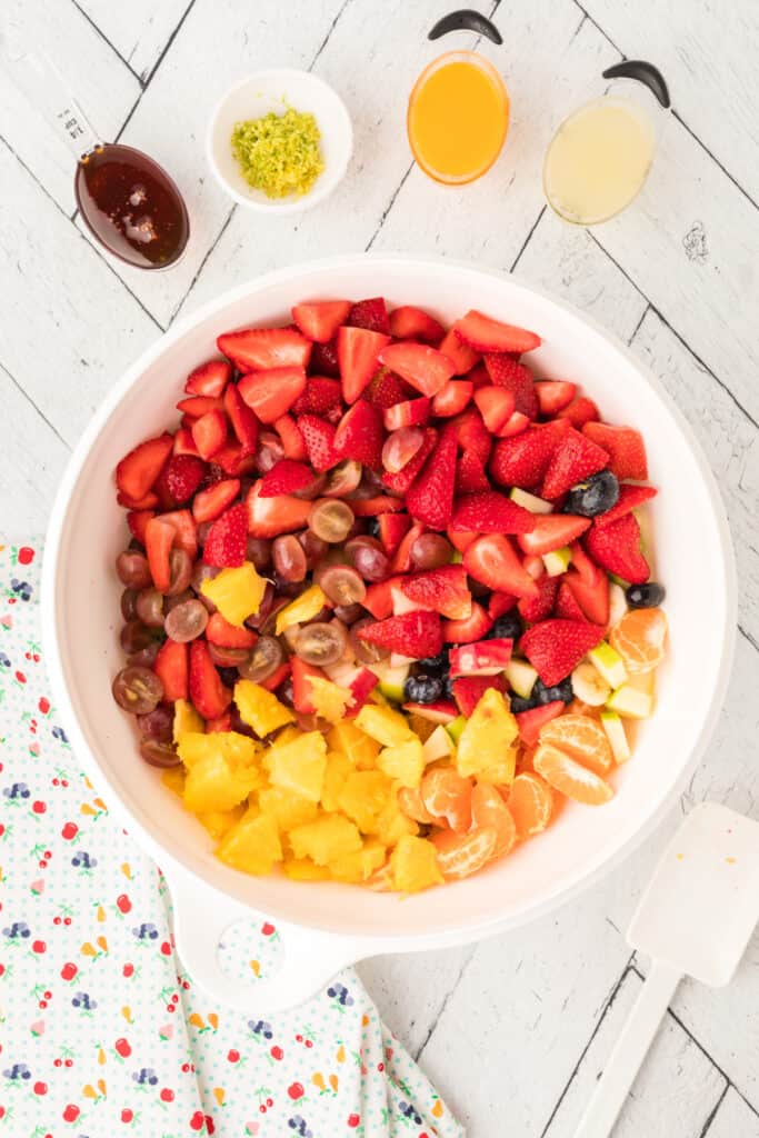 Place all of the fruit in a large bowl. Set aside.