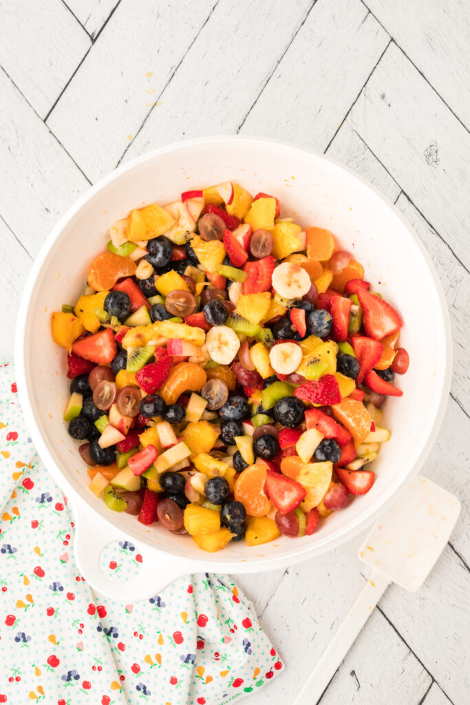 Pour the dressing over the fruit and stir to coat. Serve immediately or refrigerate.