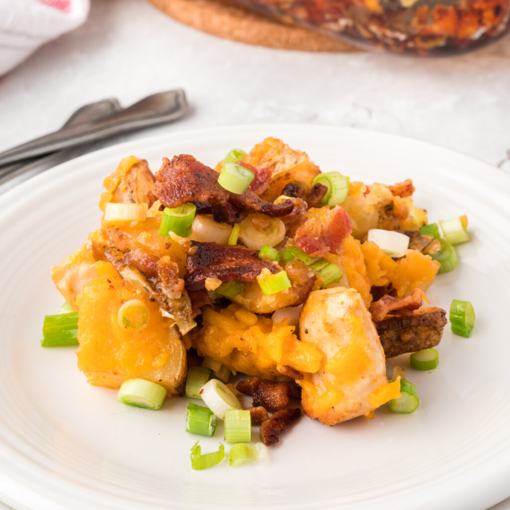 scoop of loaded potato and chicken casserole on plate