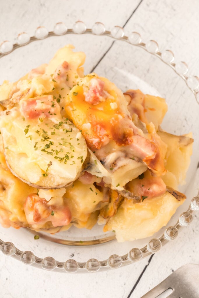 scalloped potatoes recipe on glass plate