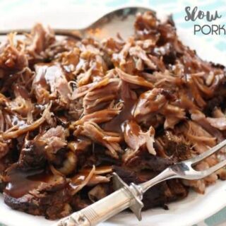 Slow Cooker Pork Roast on a plate with a fork.