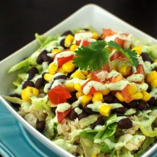 Burrito Bowls with Light Tomatillo Ranch Dressing in a bowl.