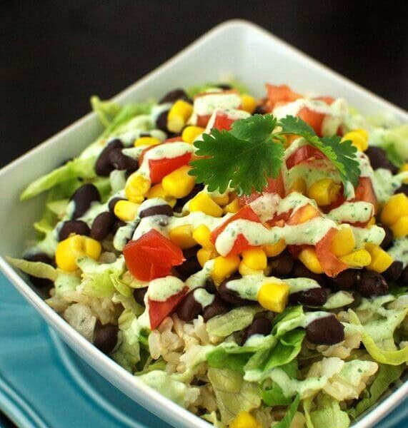 Burrito Bowls with Light Tomatillo Ranch Dressing in a bowl.