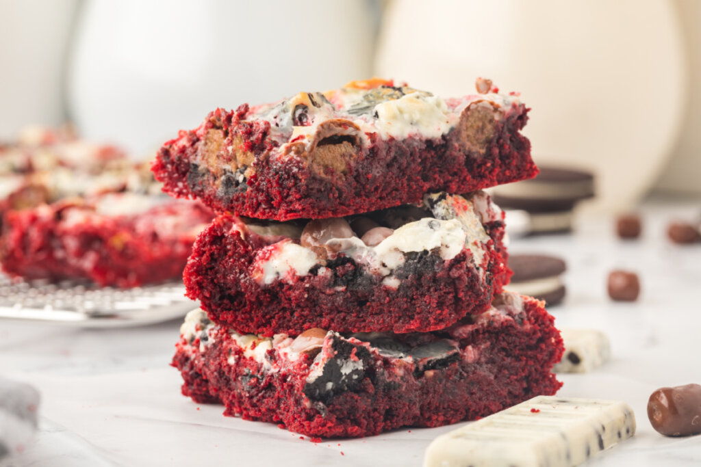 three red velvet cookie bars stacked