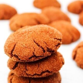 Chocolate Snickerdoodles stacked up on a plate.